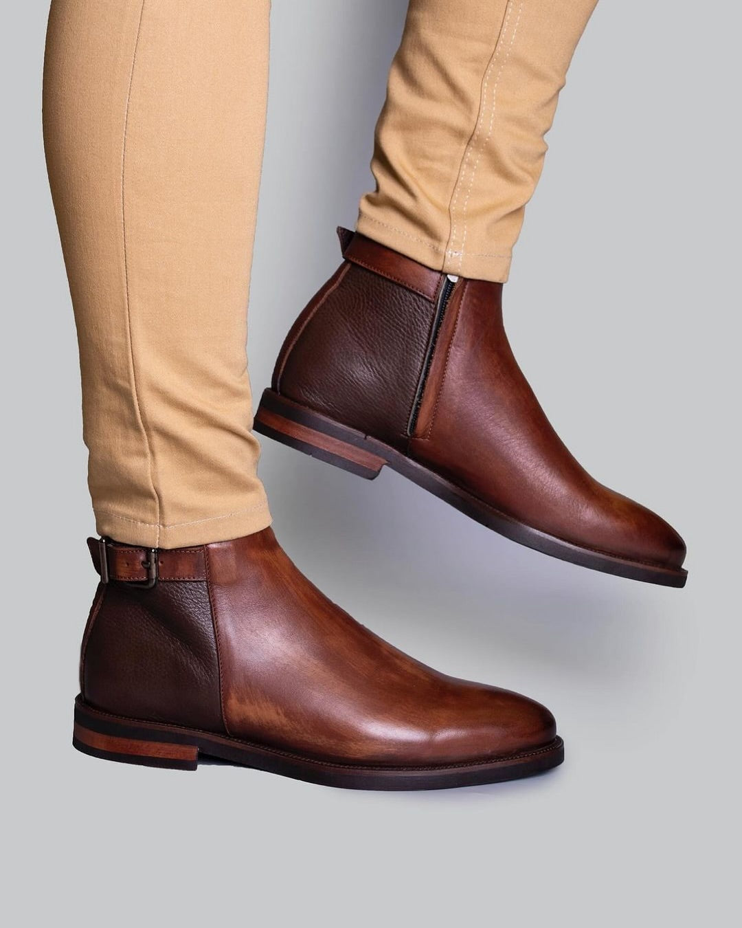 Buckled leather and suede ankle boots