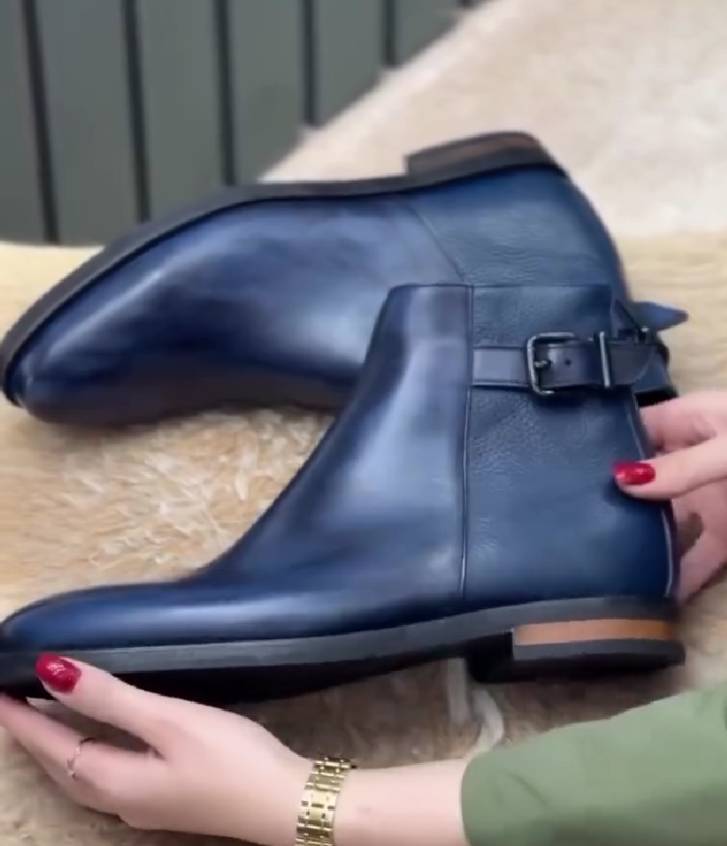 Buckled leather and suede ankle boots