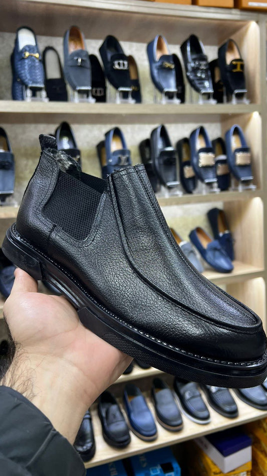 Black handmade leather boots